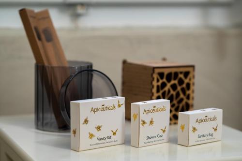 three white boxes sitting on a counter next to a container at Messavόli Residences in Mesaria