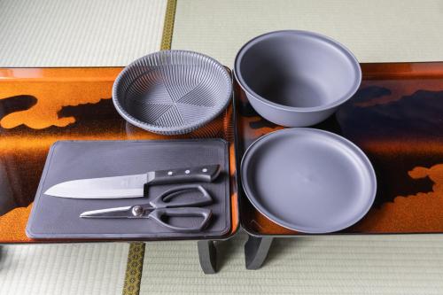 a set of utensils in a box with a strainer at SAMURAI Base in Hakone