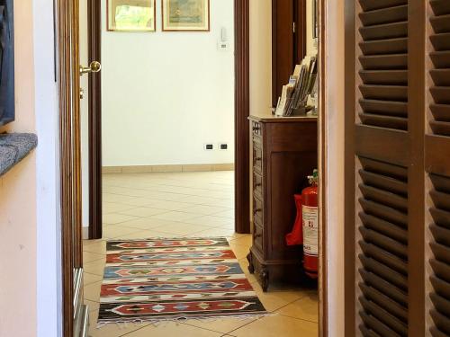 Casa Intignano - appartamento con terrazzo vista lagoにあるベッド