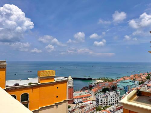 a view of the ocean from a city at Sunset town Phú Quốc in Phu Quoc