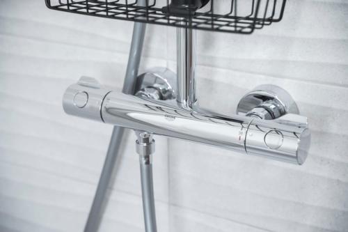 a chrome bathroom faucet with a mirror on a wall at Due Maestà Home in Reggio Emilia