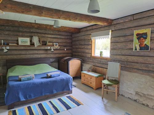 Ένα ή περισσότερα κρεβάτια σε δωμάτιο στο Kooti Ait