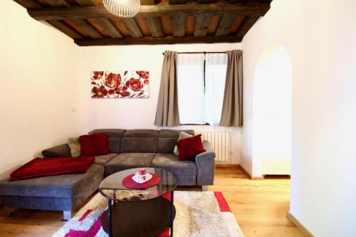 a living room with a couch and a table at Ferienhaus Hadernigg in Hadernigg