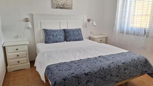 Postel nebo postele na pokoji v ubytování Ocean Breeze Albatros