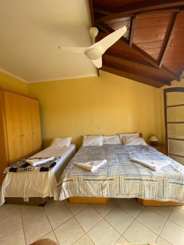 Postel nebo postele na pokoji v ubytování HOTEL VELHA CORTE