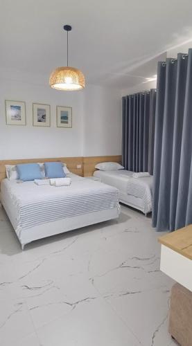 Katil atau katil-katil dalam bilik di Serendipity Apartment Radhime