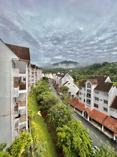 a view of a town with houses and a street at Minions In The Hills in Bentong