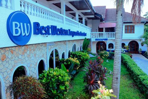 a building with a sign that reads buy best student hotel at Best Western Jangwani Sea Breeze Resort in Dar es Salaam