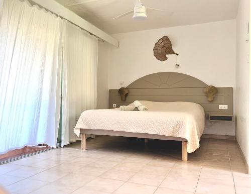 a bedroom with a large bed in a room at #Vacances en #Martinique in Sainte-Anne