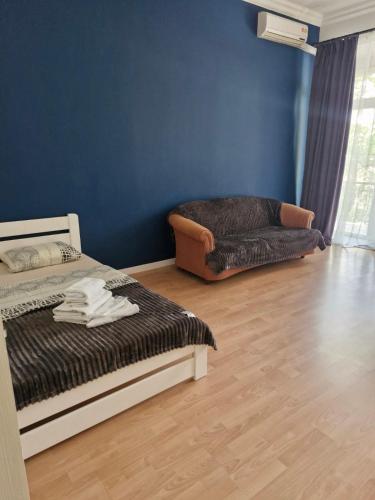 Кровать или кровати в номере Apart-Hotel next to Deribasivska