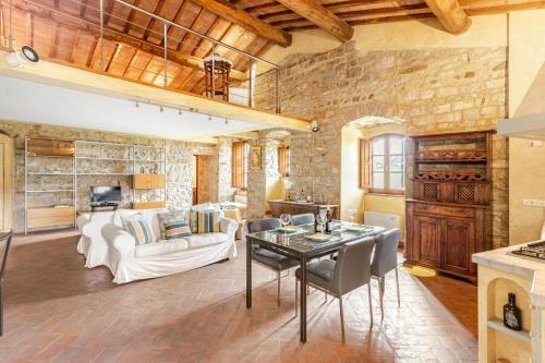 Ένα ή περισσότερα κρεβάτια σε δωμάτιο στο Chianti Essence Apartment