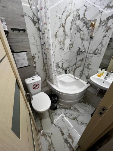 Koupelna v ubytování OliverApartments