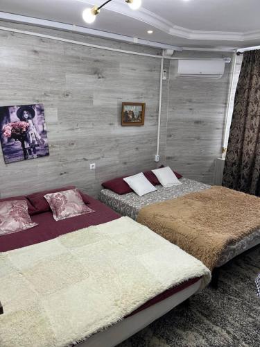 Postel nebo postele na pokoji v ubytování OliverApartments