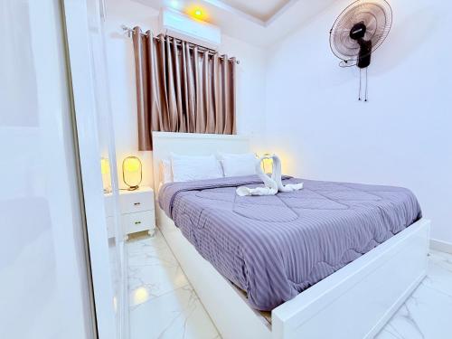 Postel nebo postele na pokoji v ubytování White Gorf Hotel