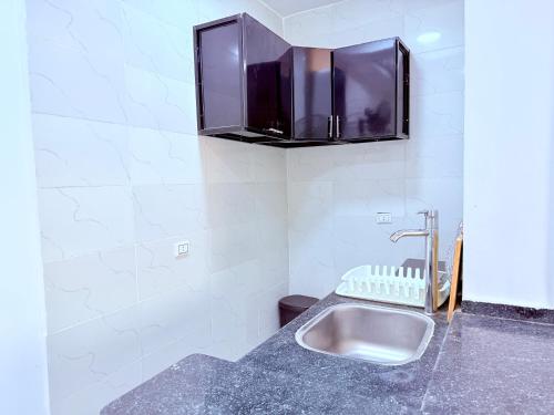 Kuchyň nebo kuchyňský kout v ubytování White Gorf Hotel