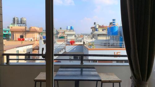 a view of a large ship from a window at Lavish Stay at Boudha, Kathmandu, Heuju Residence in Kathmandu
