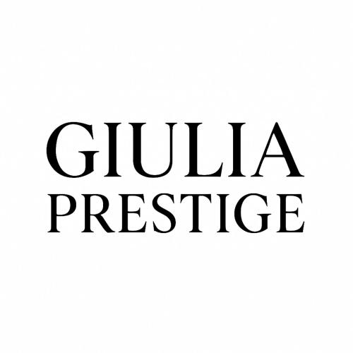 un panneau avec les mots Guillaume Prestige en texte noir dans l'établissement Giulia Prestige, appartement avec Terrasse Luxe & Confort aux Portes de Paris, à Clichy
