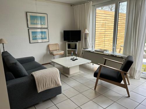 Χώρος καθιστικού στο Gemütliches Ferienhaus am Meer