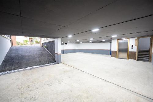 an empty parking lot in a parking garage at Meraki Villa Đà Lạt in Khu Chi Lăng