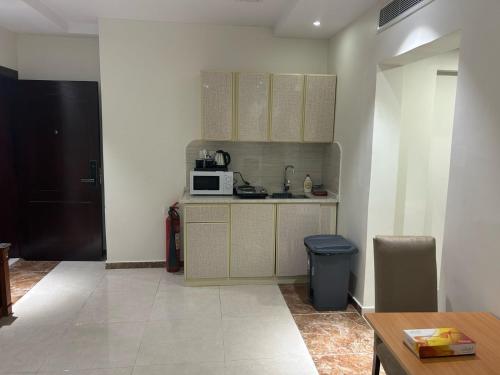 Dapur atau dapur kecil di أجنحة الفرسان المتحدة بالحمدانية