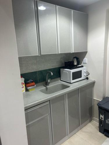 Dapur atau dapur kecil di أجنحة الفرسان المتحدة بالحمدانية