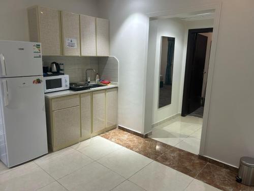 Dapur atau dapur kecil di أجنحة الفرسان المتحدة بالحمدانية