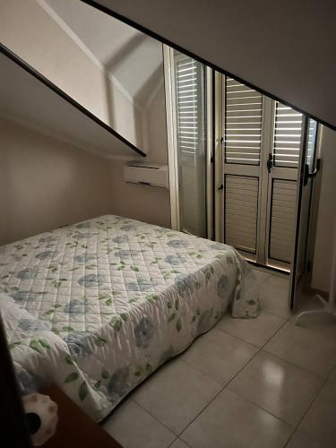Ένα ή περισσότερα κρεβάτια σε δωμάτιο στο Casa vacanze fronte mare