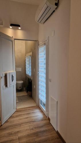 Letto o letti in una camera di zona Ospedali - piano terra tranquillo - clima - Nina