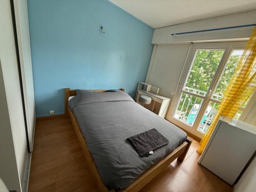 Ένα ή περισσότερα κρεβάτια σε δωμάτιο στο 4 bedroom apartment