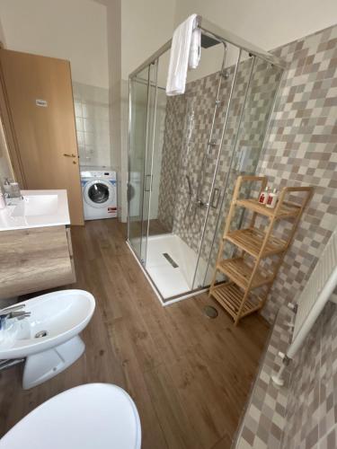 a bathroom with a shower and a toilet and a sink at La Casa Del Matese in Piedimonte dʼAlife