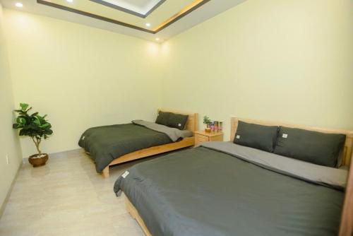 Postel nebo postele na pokoji v ubytování Sơn Dalat house