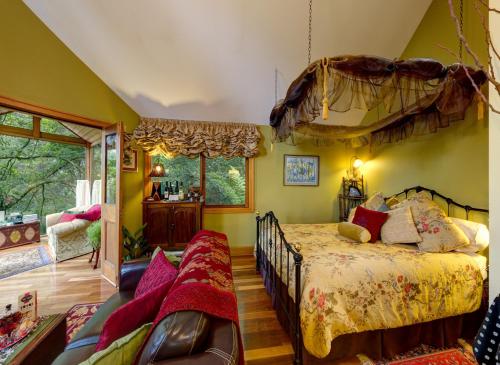 Postelja oz. postelje v sobi nastanitve Arcadia Cottages