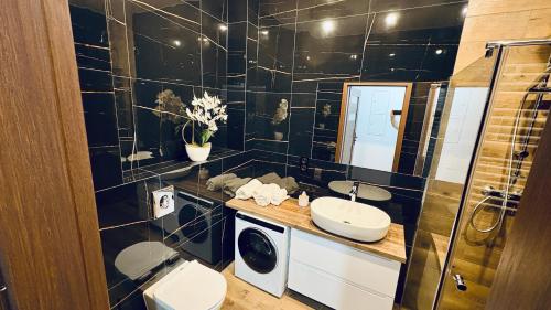 Ένα μπάνιο στο Apartament Skłodowskiej WINDA NOWY LOKAL