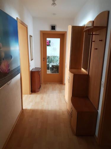 a room with a hallway with a door to a room at Ferienwohnung Schamne in Wutöschingen