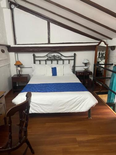 Кровать или кровати в номере Hotel Casa de la Luz