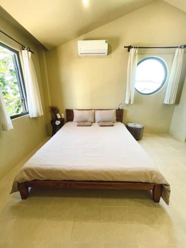 Postel nebo postele na pokoji v ubytování Biển house