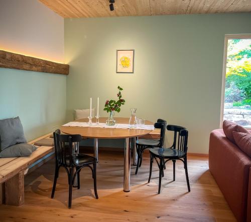 Χώρος καθιστικού στο Amber Ferienhain - Ferienhaus 'Magnolie' mit verwunschenem Garten & privater Sauna
