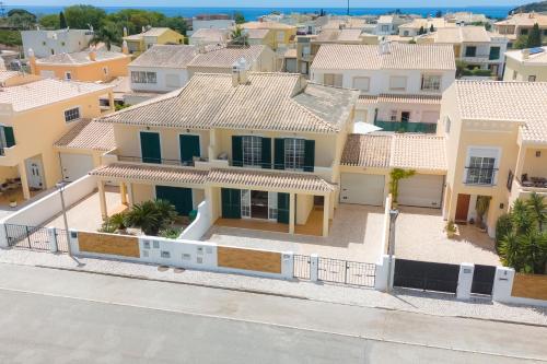 arial view of a house in a city at Spacious Villa - Walk to Beach & City Center in Lagos