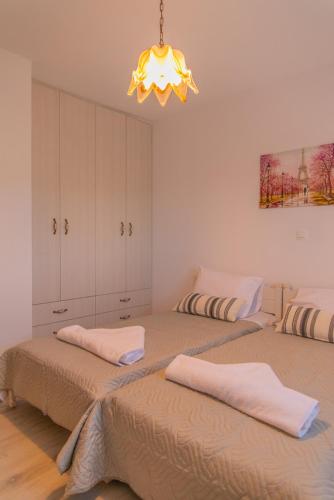 Кровать или кровати в номере Varidi Farm House