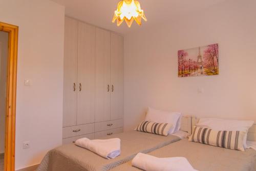 Кровать или кровати в номере Varidi Farm House