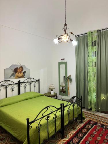 Postel nebo postele na pokoji v ubytování Le Macine 1868