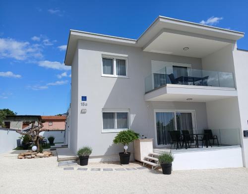 Villa Veluana apartment 3 with a balcony