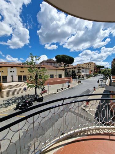 a view of a city street from a balcony at Casa Vacanze Fiore Ciampino Airport - Rome Station - 108 mqs in Ciampino