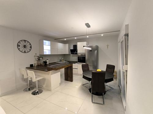 Kuchyň nebo kuchyňský kout v ubytování Apartments Villa Tanja