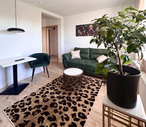 Schön gelegene und gemütliche Ferienwohnung am Weseruferにあるシーティングエリア