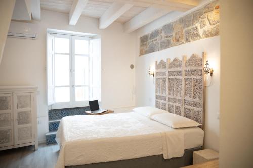 Postel nebo postele na pokoji v ubytování B&B Terra - Stanza Viaggio
