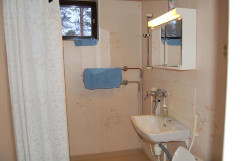 Ett badrum på Apartementos Saukkohaka