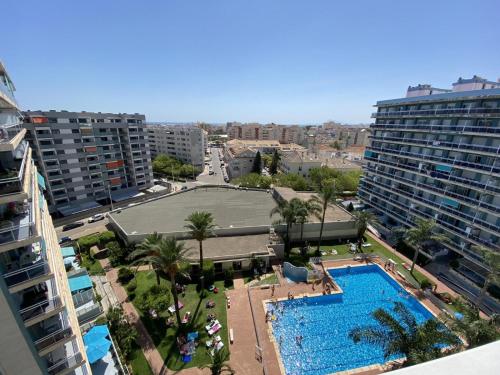 Πισίνα στο ή κοντά στο Apartamento con piscina en la Playa de Gandia