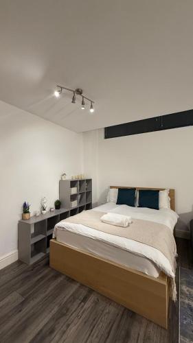 Ένα ή περισσότερα κρεβάτια σε δωμάτιο στο City Centre Studio Plus Sofa Bed