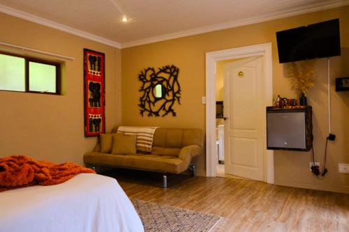 Μια τηλεόραση ή/και κέντρο ψυχαγωγίας στο BWHALE guest house B&B